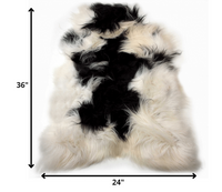 24" x 36" x 1.5" x 2" Spotted Sheepskin Single Long-Haired - Area Rug