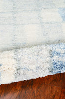 7' x 9'  Polypropylene Ivory or Blue Area Rug