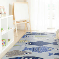 5' x 7' Light Blue School of Fish Indoor Area Rug