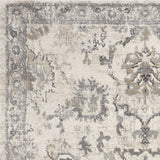 9'x13' Ivory Machine Woven Distressed Floral Traditional Indoor Area Rug