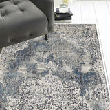8'x11' Ivory Machine Woven Distressed Diamond Floral Medallion Indoor Area Rug