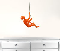 6" x 3" x 3" Resin Orange Climbing Man