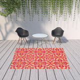 6' x 9' Pink and Orange Medallion Indoor Outdoor Area Rug