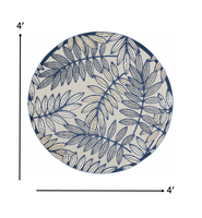 5? x 7' Ivory and Navy Leaves Indoor Outdoor Area Rug