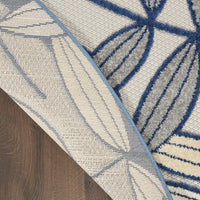 5? x 7' Ivory and Navy Leaves Indoor Outdoor Area Rug