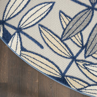 5? x 7' Ivory and Navy Leaves Indoor Outdoor Area Rug