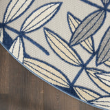 5? x 7' Ivory and Navy Leaves Indoor Outdoor Area Rug