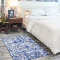 4? x 6? Ivory and Navy Abstract Grids Area Rug