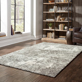 7? x 10? Gray and Ivory Distressed Abstract Area Rug