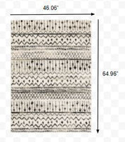 4? x 6? Ivory and Black Eclectic Patterns Indoor Area Rug