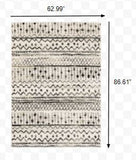 5? x 7? Ivory and Black Eclectic Patterns Indoor Area Rug