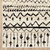 7? x 9? Ivory and Black Eclectic Patterns Indoor Area Rug