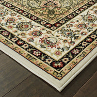 6' x 9' Ivory Beige Machine Woven Oriental Indoor Area Rug