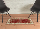 1' x 3' Red Ivory Machine Woven Floral Oriental Indoor Area Rug