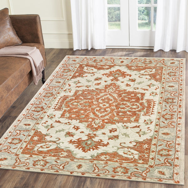 5? x 8? Orange and Ivory Medallion Area Rug