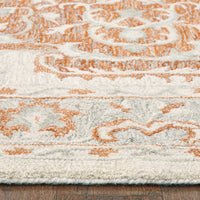 5? x 8? Orange and Ivory Medallion Area Rug