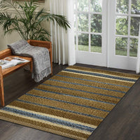 7? x 9? Tan and Blue Striped Area Rug