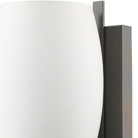 Geometric Bronze Wall Sconce with Frosted Glass Shade