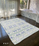 5' X 7' Light Green And Beige Oriental Area Rug