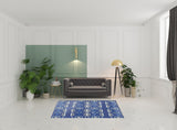 5' X 7' Muted Blue And White Oriental Area Rug