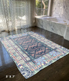 5' X 7' Red And Green Oriental Area Rug