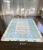 5' X 7' Cream Oriental Area Rug