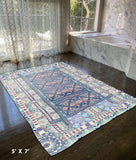 5' X 7' Red And Green Oriental Area Rug