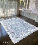 5' X 7' Light Blue Oriental Area Rug