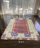 5' X 7' Red Oriental Area Rug