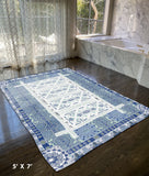 5' X 7' White And Blue Oriental Area Rug