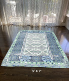 5' X 7' Green And Blue Oriental Area Rug