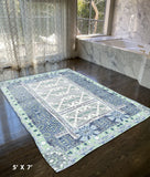 5' X 7' Green And Blue Oriental Area Rug