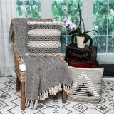 Boho Black and Beige Woven Diamond Pattern Throw with Tassels