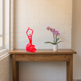 Red Women Stretching Sculpture